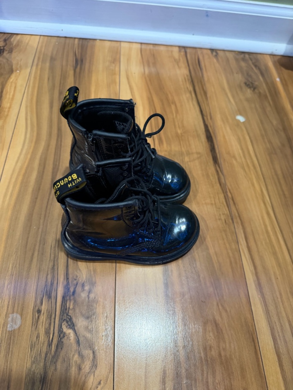 Dr. Martens Black Kids Lace-Up Combat Boots with Yellow Heel Loop